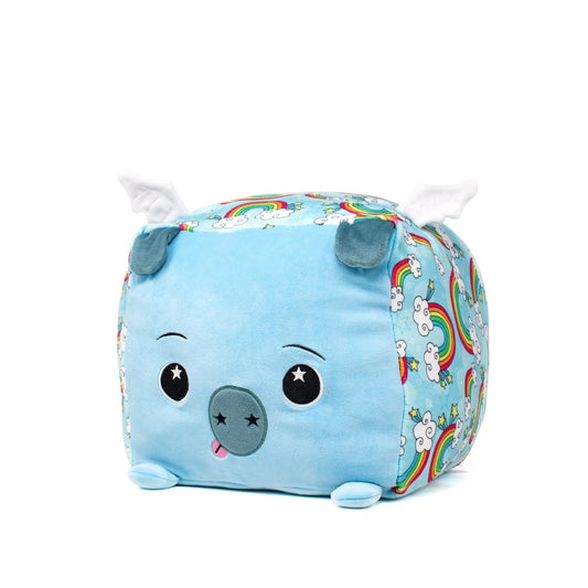 Augustus the Pig Plushie is a soft blue cube-shaped pillow featuring a pig face, white wings, rainbow and cloud sides, embroidered eyes, a round snout, and a small pink tongue for extra sensory comfort.