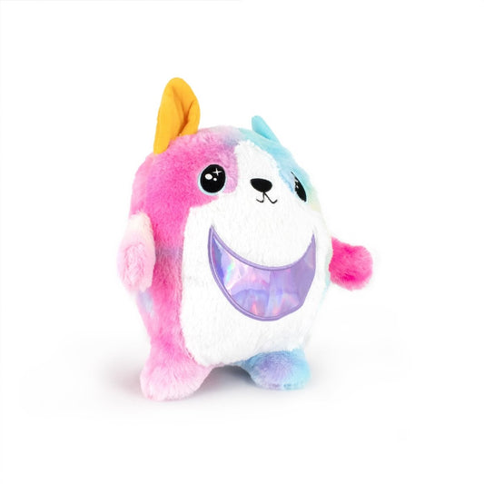 The Corgi Bestie Monstah is a cuddly stuffed animal with pastel pink, blue, and white fur, an orange ear, a blue tuft on its head, black eyes, two small legs, and a shiny iridescent smiling mouth on its white belly.