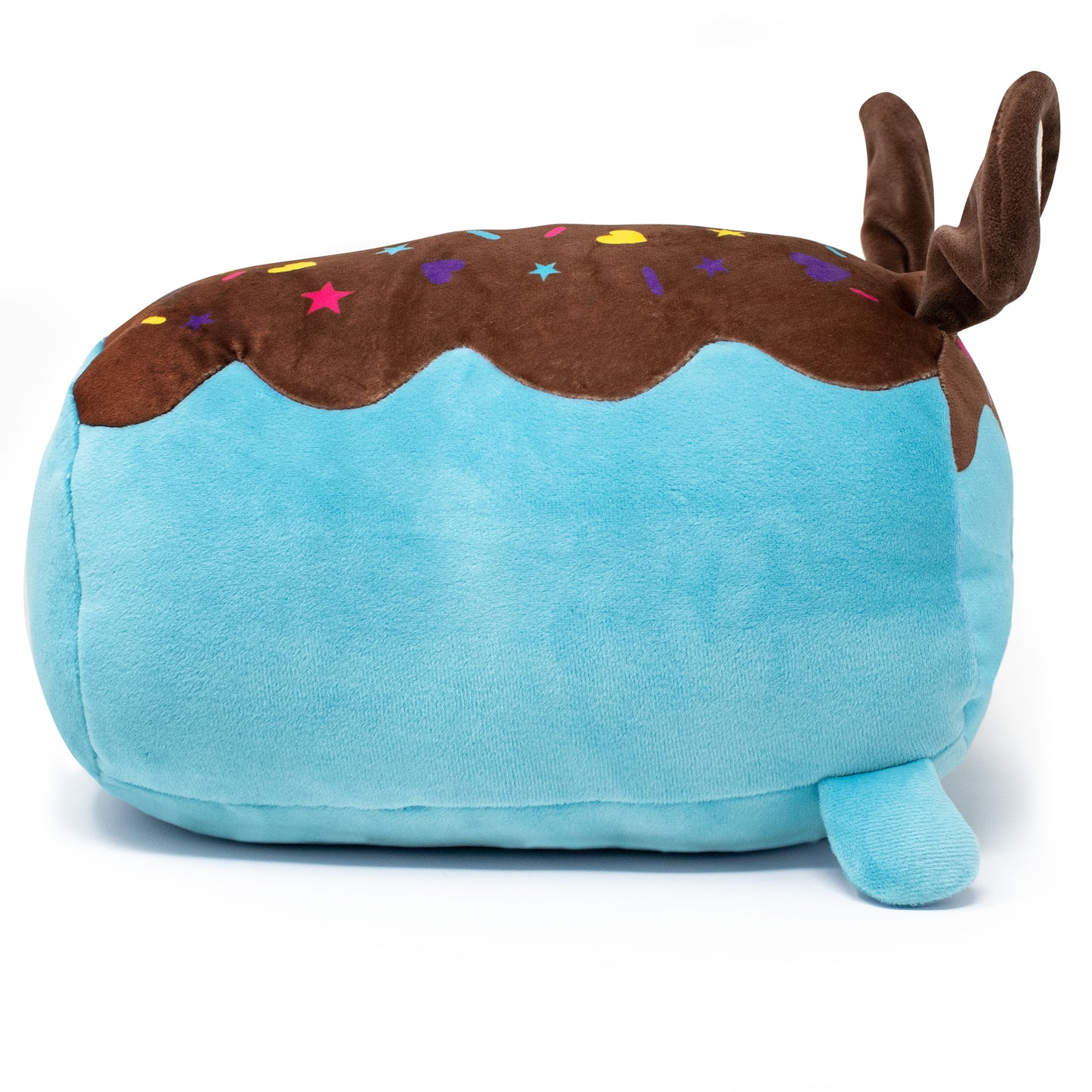 Bitty the Bunny Plushie is an adorable, plush blue whale toy featuring a brown top resembling frosting, adorned with colorful star and heart shapes. This soft whale includes a small tail fin and two brown fins that resemble charming antlers.