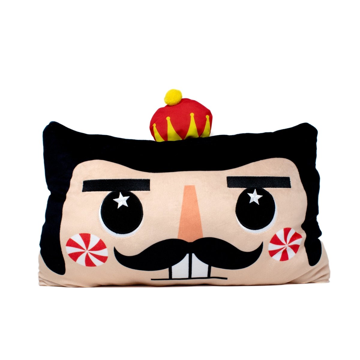 Stuart the Nutcracker Pillow features a cartoon nutcracker face with a black mustache, peppermint-swirled cheeks, and a bright crown—perfect for cozy snuggles or adding festive charm to your holiday décor.