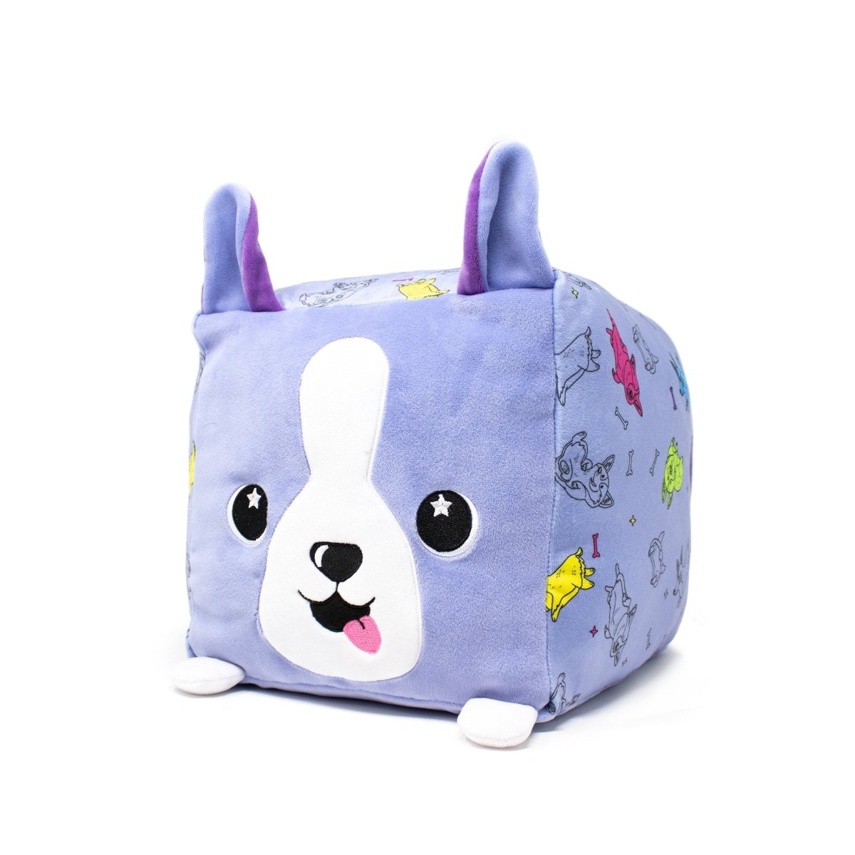 Connie the Corgi Plushie is a cube-shaped, cuddly toy with a cartoon dog face, large eyes, a tongue sticking out, and floppy ears. Its purple body showcases colorful corgis in playful poses. Machine washable for easy cleaning, it's perfect for snuggling!.