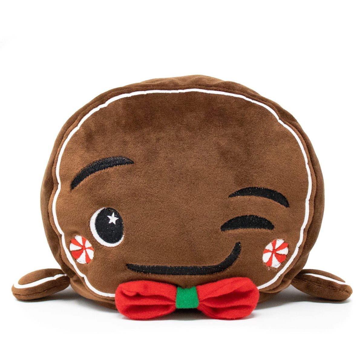 Gingersnaps the Gingerbread Plushie is a soft pillow with embroidered winking eyes, peppermint cheeks, a red and green bow tie, and icing details—perfect for holiday plushie fans.
