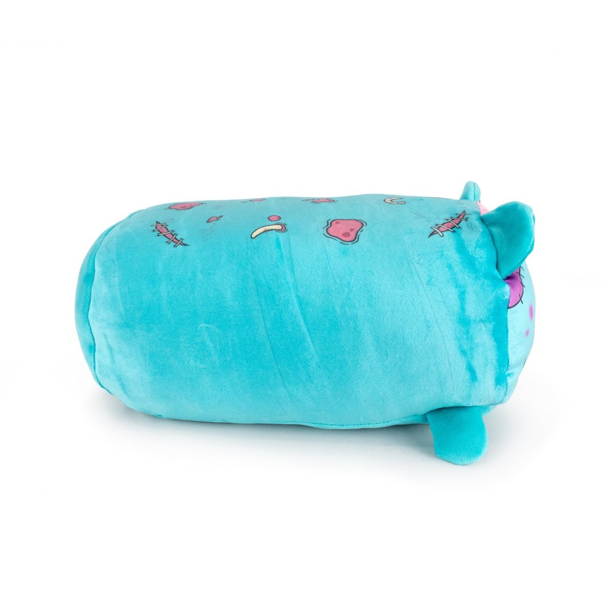 Gus the Zombie is a turquoise plush pillow shaped like a round cat with small ears, tiny legs, and pink and yellow cartoon patches—an adorable, whimsical addition to any Halloween plush collection.