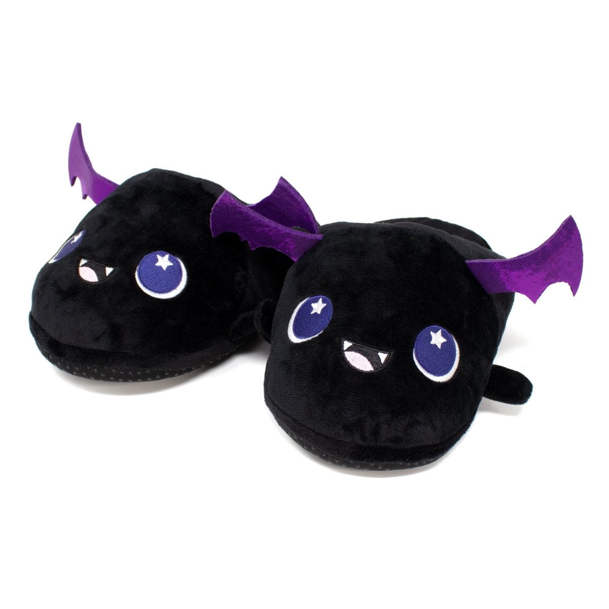 Cassie the Bat Halloween Slippers are black plush slippers resembling cute bats, featuring smiling faces, star-highlighted eyes, and purple wings. Doubling as cozy plush toys, they offer a delightful stuffed animal feel with every step.