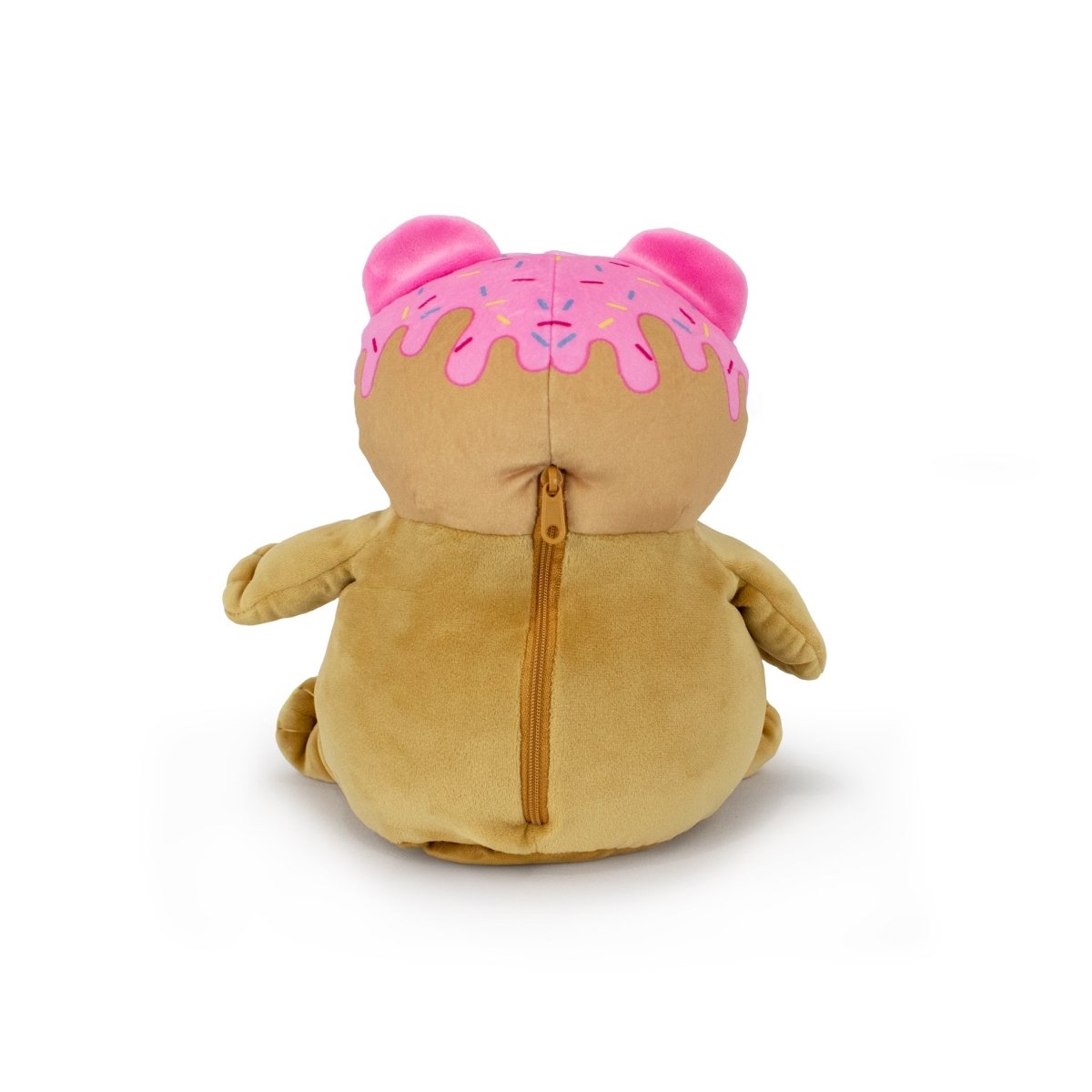 A plush Starlight Honey 2-in-1 Travel U-Neck Pillow sits facing backward, revealing a back zipper. It features a light brown body and a pink head with sprinkle designs that look like icing.