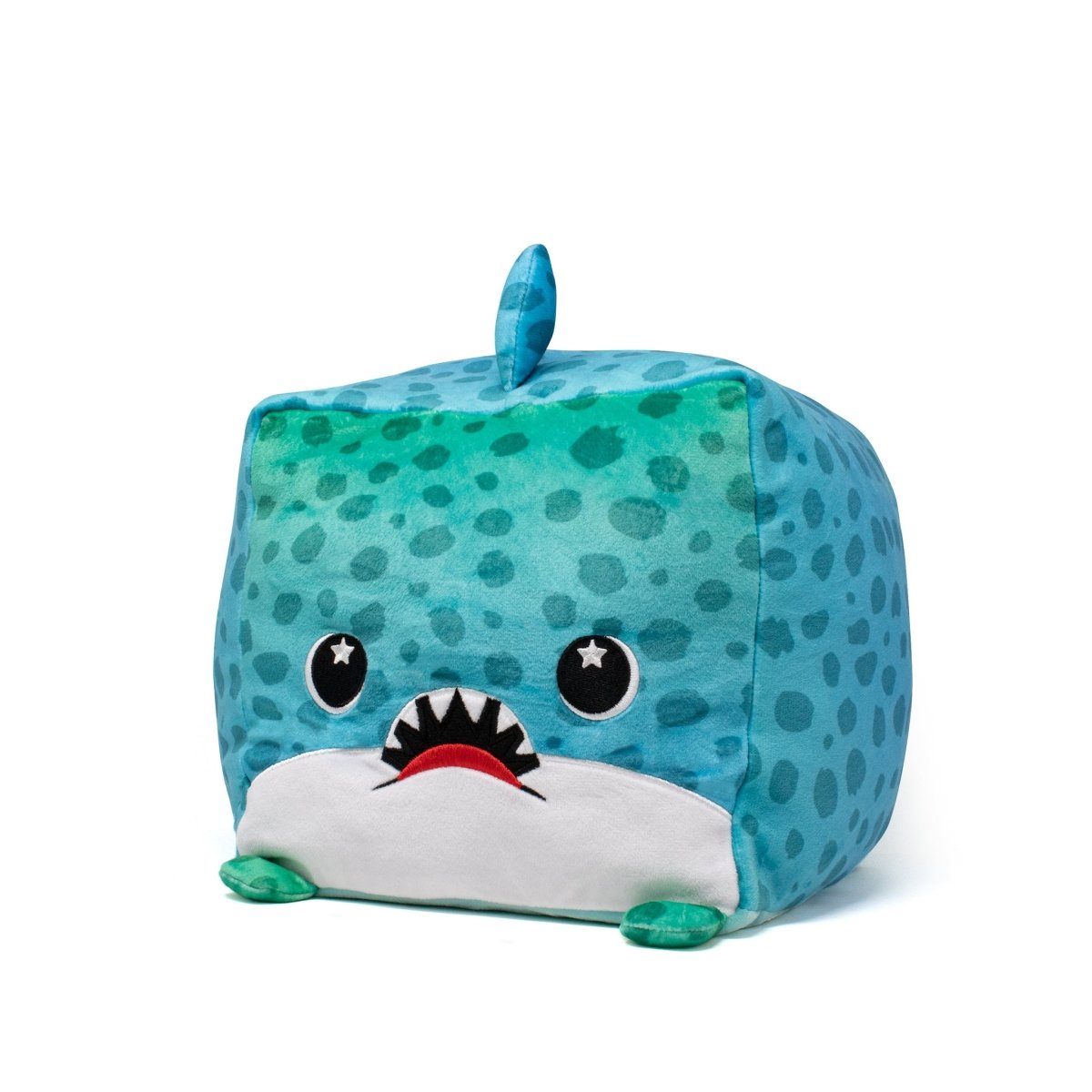 Meet Houdeenie the Leopard Shark Plushie—a teal, dotted square plush toy with a small dorsal fin. It features sensory softness, big round eyes with white stars, a wide mouth with tiny pointed teeth, and small green fins. Plus, it's machine washable!.