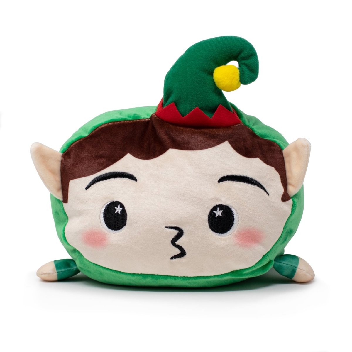 Jingle the Elf Plushie is a round, plush toy with a green hat, pointed ears, brown hair, rosy cheeks, and starry eyes—perfect as a cute holiday plushie. It is shown sitting on a white background.