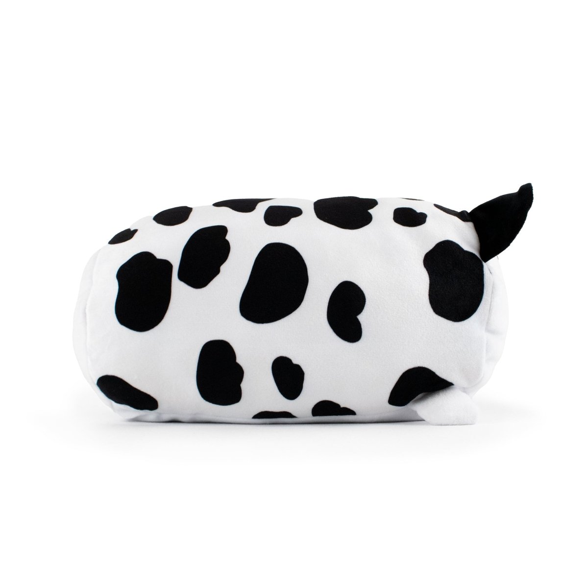 Leche the Cow Plushie is a soft, cylindrical pillow resembling a cow with a white body, black spots, and a small black tail. It lacks facial features, adding to its charm as the ideal stuffed animal companion for cozy moments.