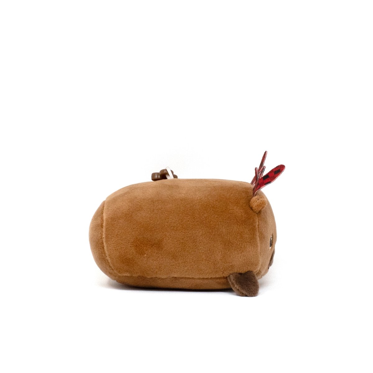 A medium-sized, cute Eduard the Moose Clip-On plush toy with a minimalist design and small antlers lies on its side. Its soft, fuzzy fabric enhances its cuddly appearance.