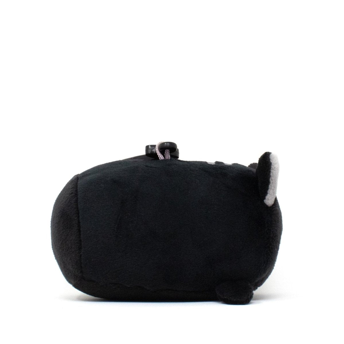Fortune the Cat Clip-On is an adorable small, round black plush toy shaped like a creature with a tiny tail, one visible ear, and a loop on top against a plain white background.