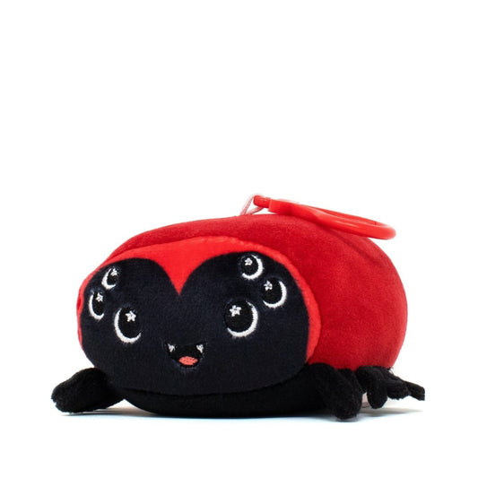 Muffet the Spider Clip-On is a plush toy from the Moosh-Moosh Spooky Series, featuring a red and black spider with six shiny eyes, a smiling face, small black legs, and a red clip on top for easy hanging.