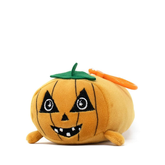 Vincent the Pumpkin Clip-On is a plush keychain from the Moosh-Moosh Spooky Series, shaped like a smiling jack-o'-lantern with stitched black eyes and mouth, a green stem, and an orange plastic clip.