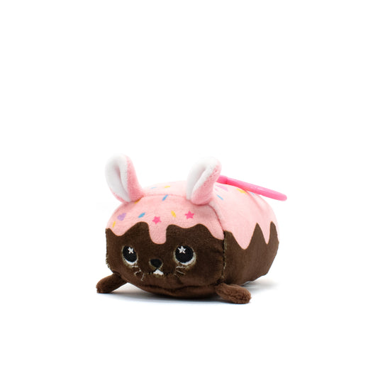 Introducing the "Harry the Bunny Plush Clip-On," a charming dessert-inspired plushie with a chocolate brown base, pink icing, colorful sprinkles, embroidered features, and a pink string. It's an ideal Valentine's Day gift for plush enthusiasts!.