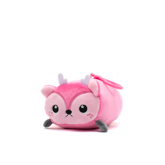Odie the Doe Plush Clip-On is an ultra-soft, pink deer plushie featuring small antlers, starry eyes, and blush-marked cheeks. It lies adorably with a cute expression, perfect for Valentine's Day. The convenient pink loop allows it to be used as a clip-on against a white background.
