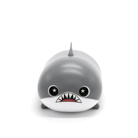 Crush the Shark Vinyl Collectible Figurine features a cute plushie shark with a round body, starry eyes, and an open mouth displaying small sharp teeth against a plain white background.