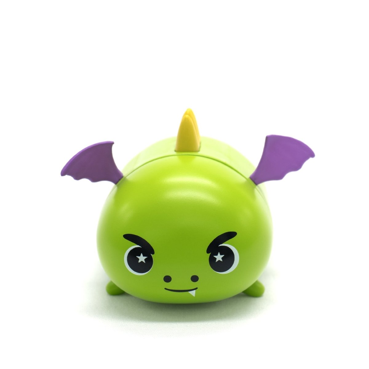 On a white background, the Drac the Dragon Vinyl Collectible Figurine is displayed. This cute green dragon sports a playful smile, yellow horn, purple wings, and star-patterned eyes.