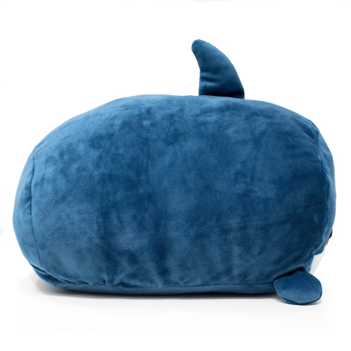 Neptune the Blue Shark Plushie is a round, plush toy with small fins and flippers. It features a soft, velvety texture and an irresistibly cute design, making it perfect for any plushie enthusiast.