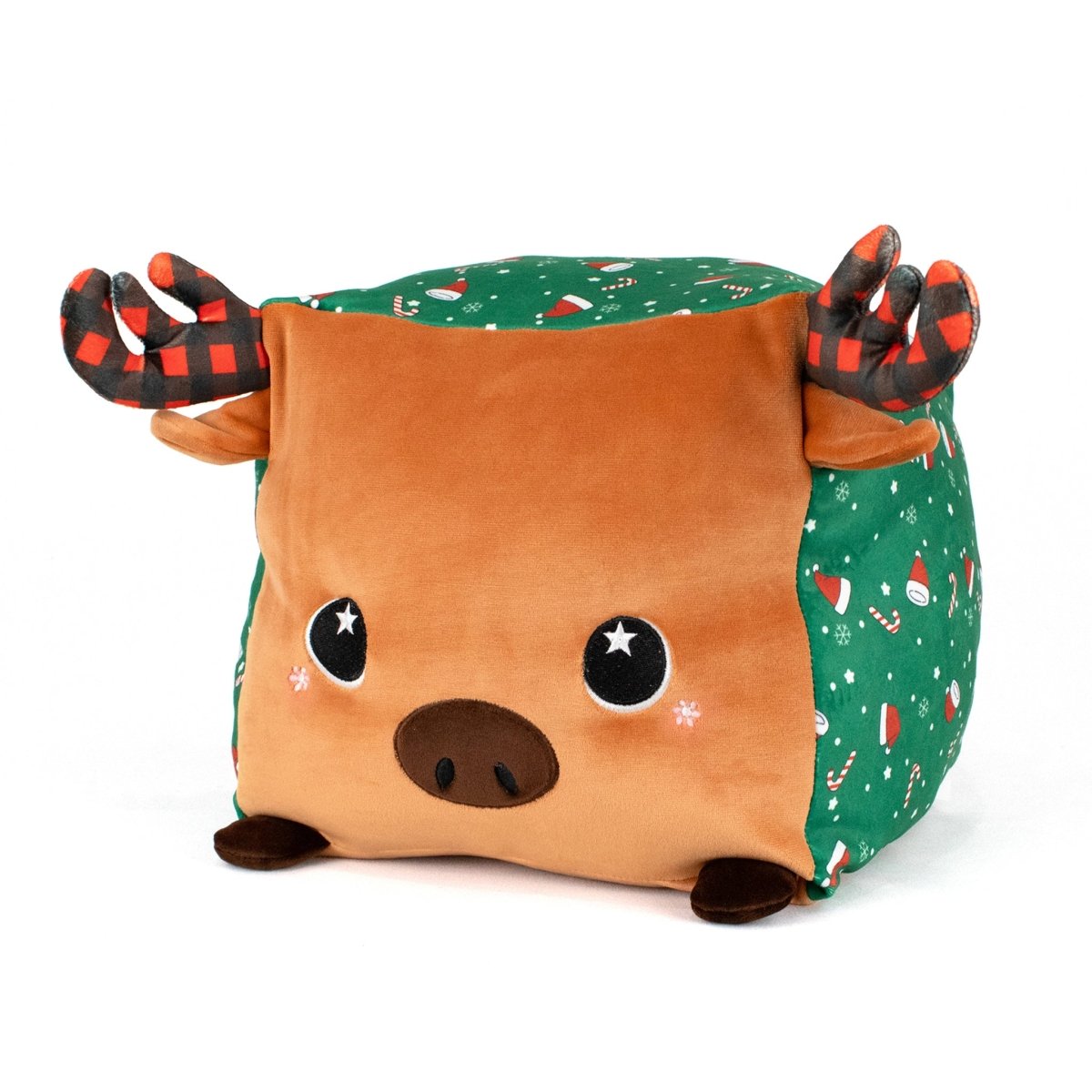 Noel the Moose is a plush, cube-shaped stuffed animal with a brown face, black eyes, red-and-black antlers, and green sides featuring festive holiday prints like candy canes and snowflakes—an adorable seasonal cuddle buddy.