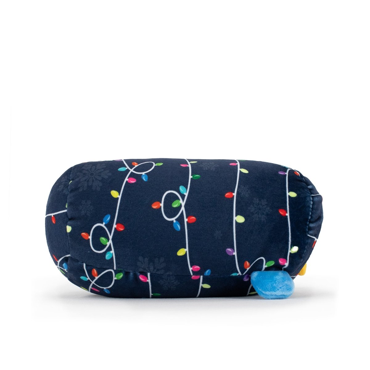 Peckington the Penguin Slumber is a navy blue plush shown sideways, featuring colorful Christmas lights, faint snowflakes, and a small blue felt foot—an ideal holiday plush for collectors and fans alike.