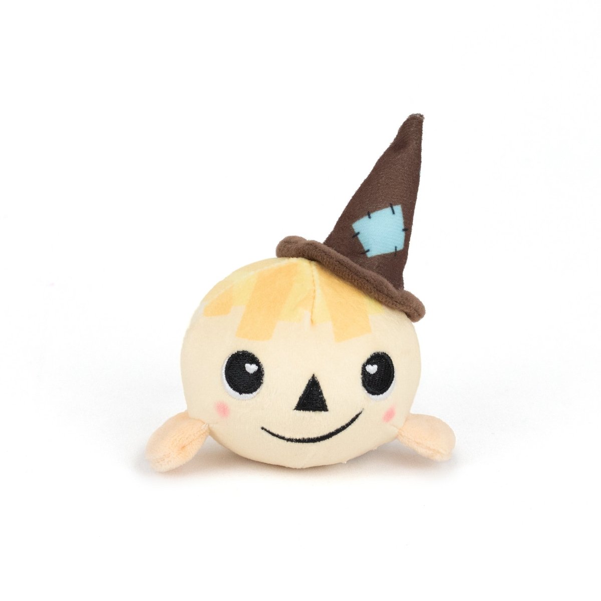 The Gretel Spooky Plushy Skwishy is a round, plush toy with a smiling face, rosy cheeks, small arms, yellow hair, and a brown pointed hat with a blue patch, shown on a white background.