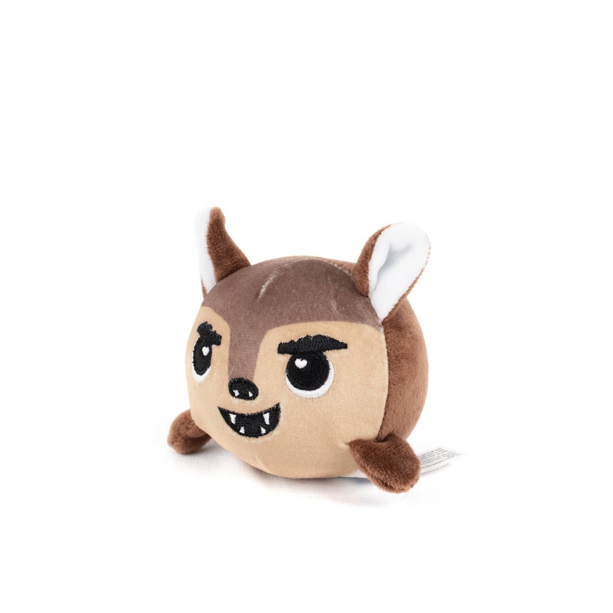 The Lobo Spooky Plushy Skwishy is a small, round plush toy featuring brown and beige fur, pointy ears, large embroidered eyes, a mischievous smile with sharp teeth, and tiny arms and legs.