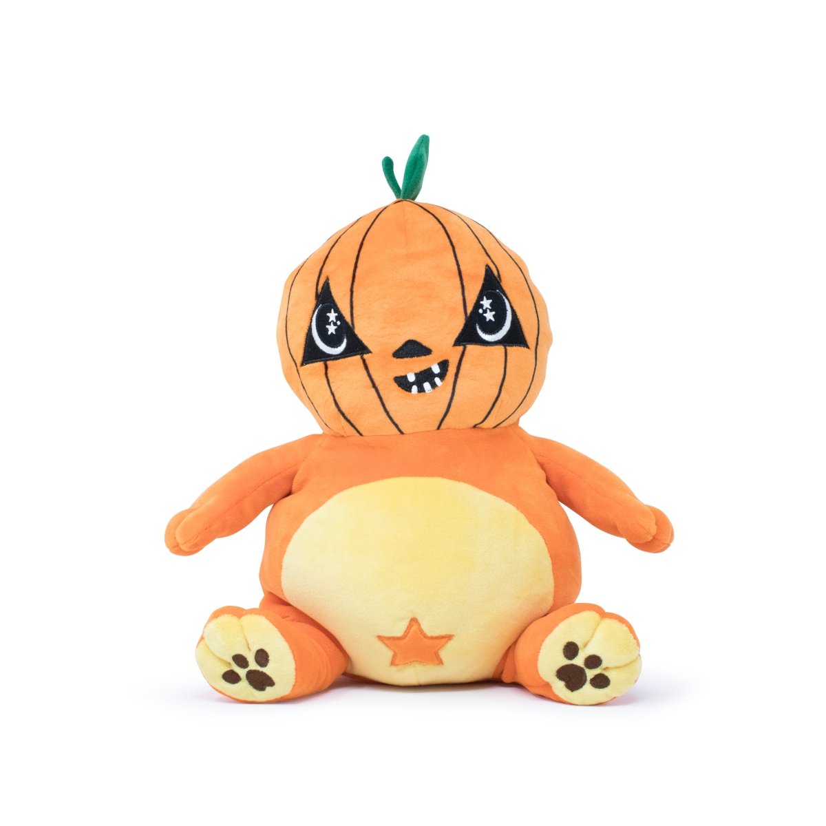 The Vincent the Pumpkin Plushie Starlight Buddy features an orange jack-o'-lantern head with a mischievous grin, black starry eyes, and an orange body with a yellow belly and paws. It sits upright with a green stem on top.