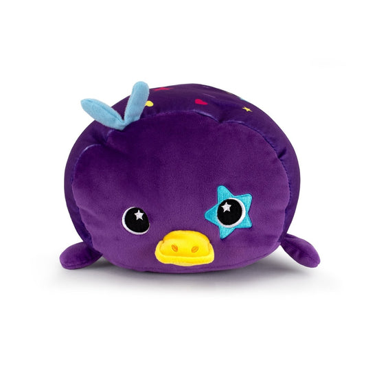 Sylvie the Platypus is a soft plush toy shaped like a purple platypus with a yellow beak, blue star around one eye, small blue horn, star-shaped pupils, and flippers—perfect for cuddling!.