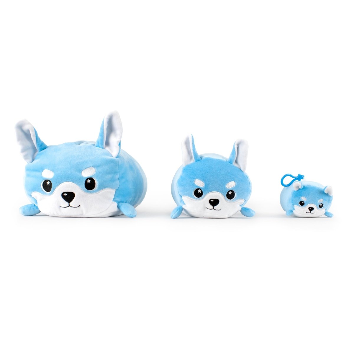 Three Yuki the Snow Fox plushies are displayed on a white background. They are blue with white accents and black eyes, arranged in a row by size from left to right: large, medium, and small.