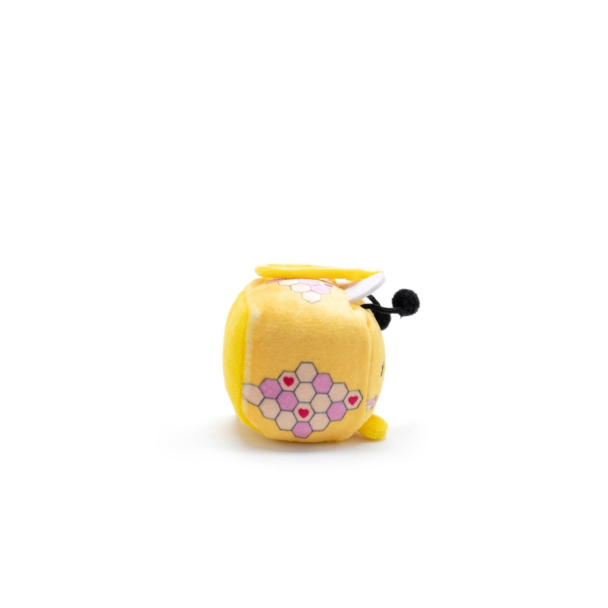 The Hex the Bee Square Plush Clip-On from Moosh-Moosh Series 1 is a small, vibrant yellow and orange plushie with pink, red, and gray embroidered hexagons. It has black antennae and tiny felt wings, making it an adorable clip-on companion for children or collectors.
