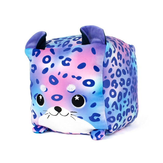Tundra the Snow Leopard is a soft, cube-shaped plush with cat ears, starry eyes, and small paws. Featuring a blue, pink, and purple leopard print and playful expression, this machine washable plush is perfect for cuddling!.