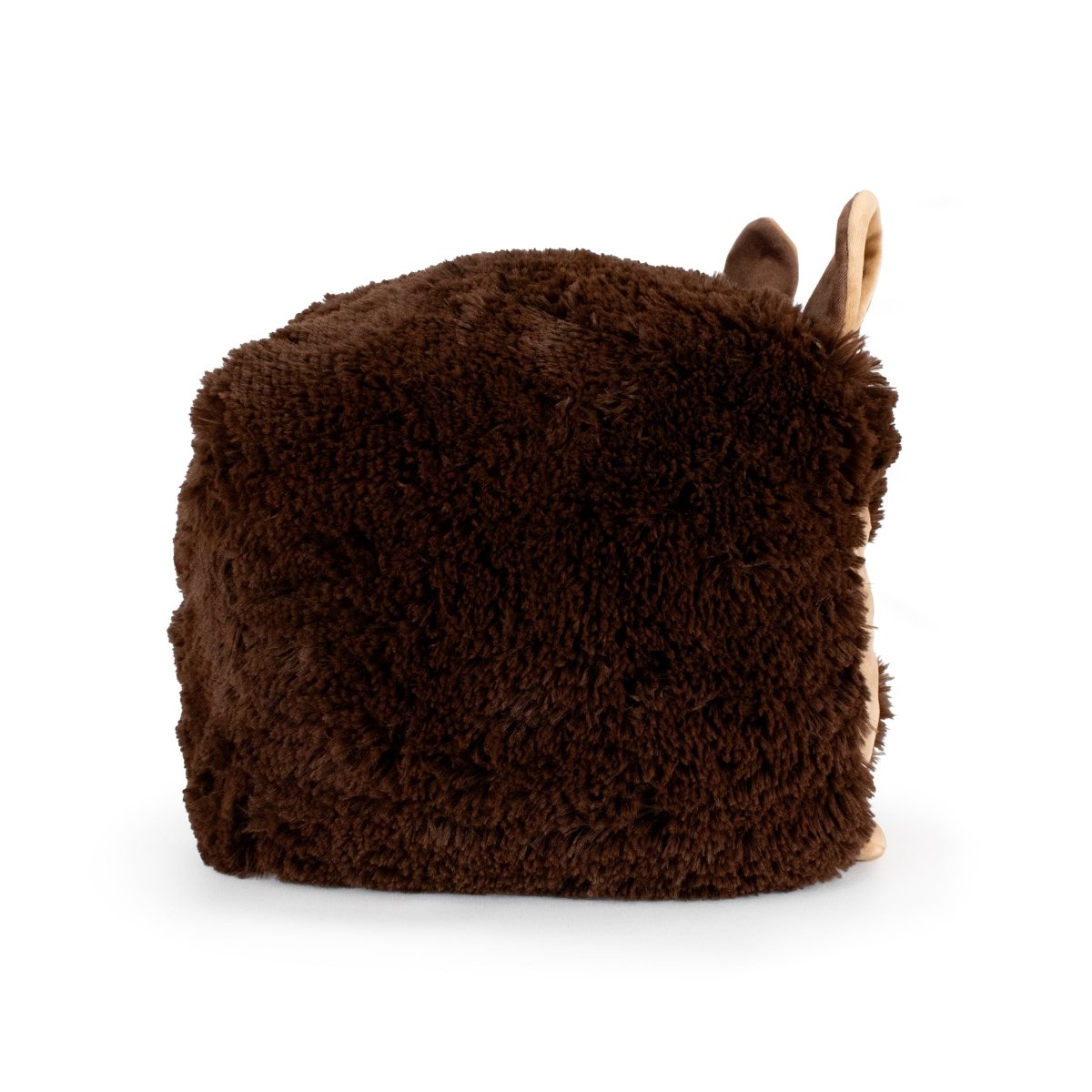 Van the Werewolf is a soft, ultra-plush, dark brown cube with fuzzy fabric and two small animal-like ears on one side, shown against a white background.