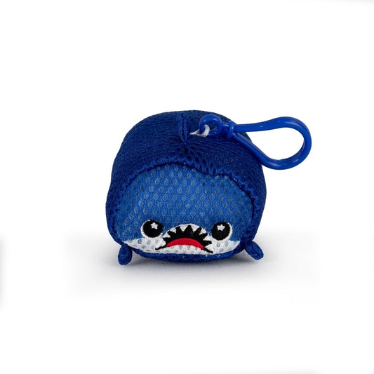 The Aqua Plush Clip-on Azul is a small, blue, fast-drying mesh cube keychain with a shark face—big eyes, toothy mouth—and a plastic clip on top, perfect for pool or bathtub fun.