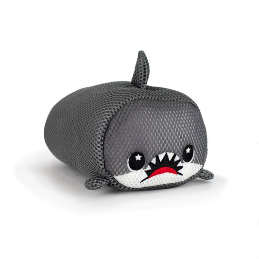 The Aqua Moosh-Moosh Crush is a plush toy shaped like a shark, featuring gray textured fabric, black and white eyes, a small top fin, and an open mouth with white teeth and a red tongue.