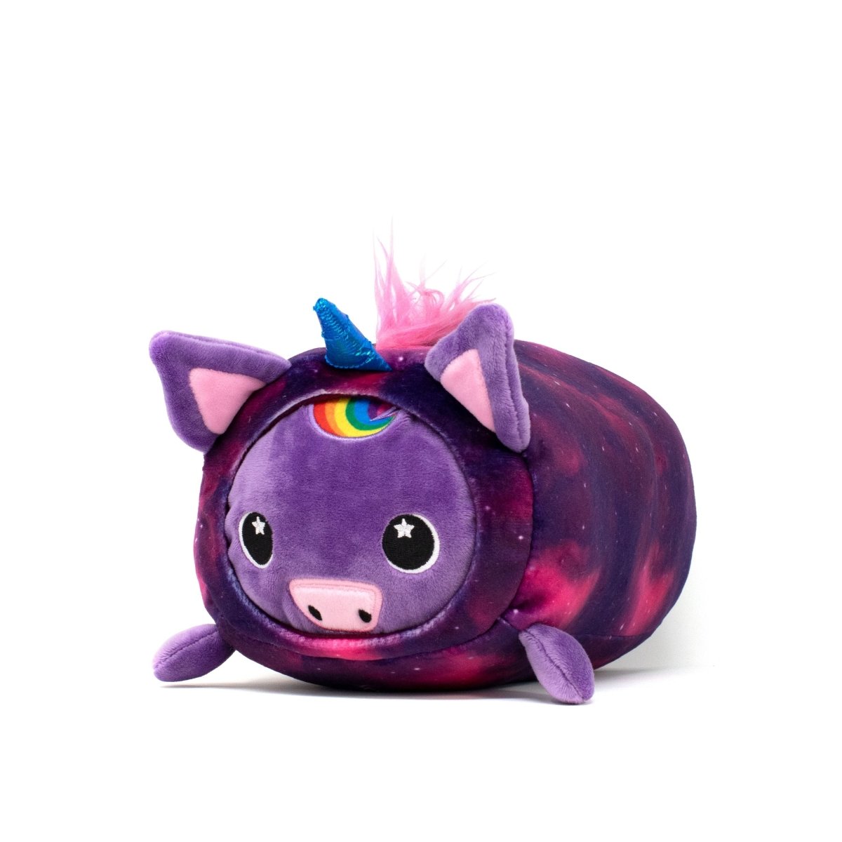 The Twinkle Slumber Plushie is a round, galaxy-themed unicorn toy resembling a plush pig, complete with a colorful horn and pink ears. It features a small rainbow on its forehead and a cosmic body pattern with star-like speckles, creating an enchanting stuffed animal.