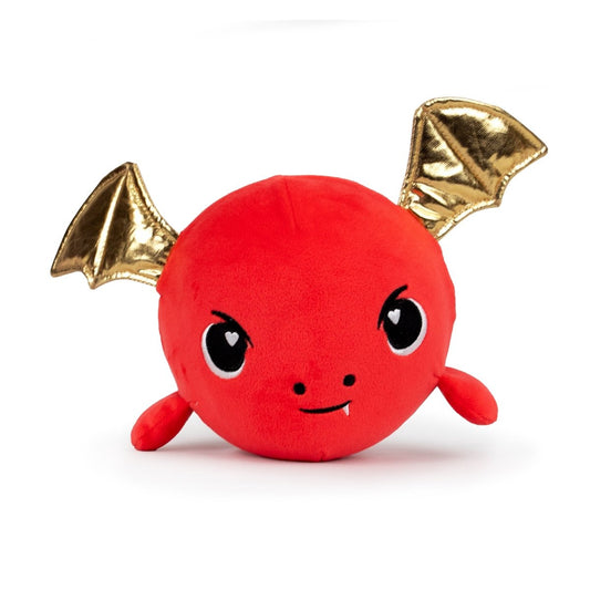 The Jumbo Plushy Skwishy Ash is a round, red plush toy with a dragon-like face featuring big eyes, small fangs, and shiny gold wings on each side.