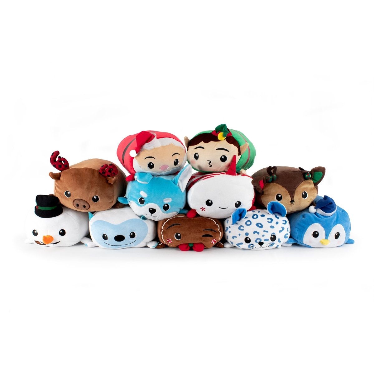 A set of ten round plush toys with festive holiday and winter animal designs—these include a penguin, deer, fox, seal, otter, Gingersnaps the Gingerbread Plushie, and two elf-dressed characters.