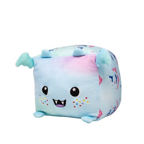 Meet Hiso the Bat—a super soft, pastel tie-dye blue plushie with small blue wings, tiny feet, big fanged smile, and colorful star cheeks. This adorable bat cube is perfect for cuddling!.