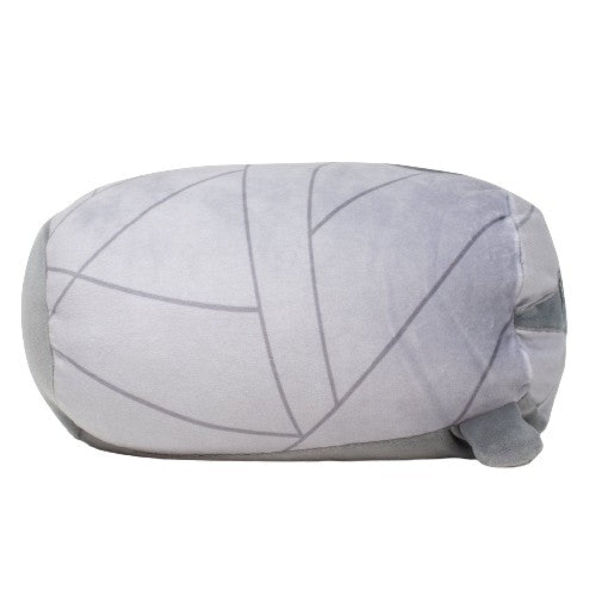 Nile the Mummy Plushie is a soft, cylindrical stuffed animal shaped like a gray whale with simple outlines and textured with smooth plush. Subtle geometric lines enhance its body, and it features a charming tail.