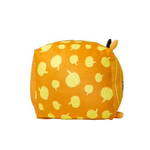 Pom-Kin the Pomeranian Pumpkin is a cute, square plush toy with an orange hue and yellow pumpkin patterns, featuring small ears. Its soft texture makes it perfect for cuddling.