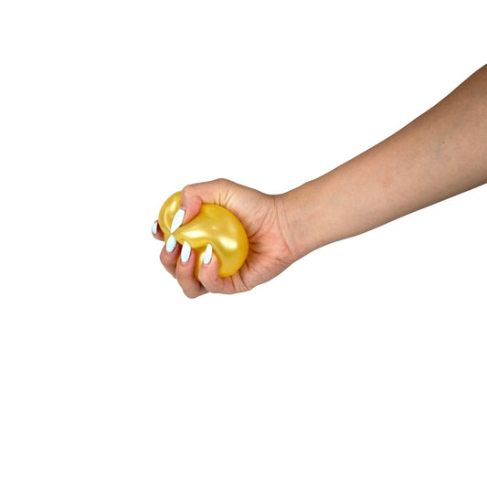 A hand with white-painted nails squeezes Bubblegum’s Favorite Toy - Sugah-mal Pearl Cubes, isolated on a white background.