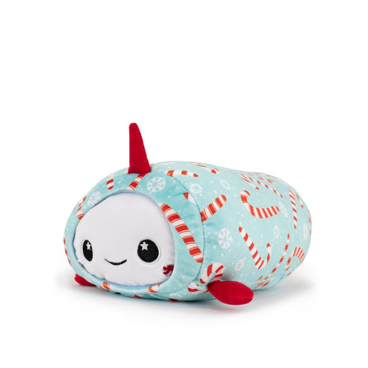 Mintie the Mint Narwhal Slumber is a cute plush with a light blue body, red horn and flippers, candy cane and snowflake patterns, and big starry eyes—the perfect holiday gift!.