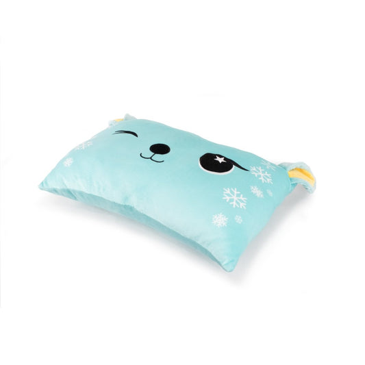 Pixca the Teal Reindeer Pillow is a light blue rectangular plushie with a cute face design: one winking eye, one open eye with a star, a small nose, and mouth. It features snowflakes around the face and soft fabric ears at the top corners.