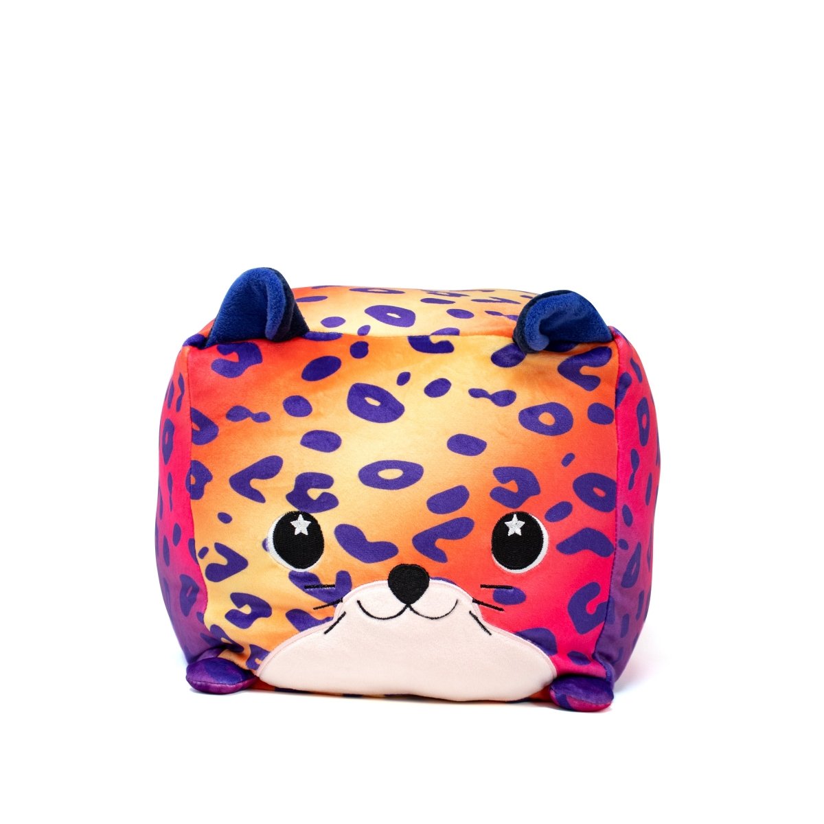 Introducing the Willow Squared Plushie, a vibrant cube-shaped plush cat. It showcases a leopard print with purple ears, blue and purple spots on a yellow-orange background, ensuring sensory softness. Its adorable face features star-patterned eyes and a small smile.