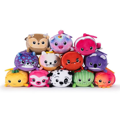 A delightful set of 12 plush toys from the Moosh-Moosh Series, including animals like a deer, unicorn, ladybug, and fruits like watermelon. Each has unique colors and expressions. One standout is Sebbie the Crab Plush Clip-On. The collection is arranged in three rows for a cheerful display.