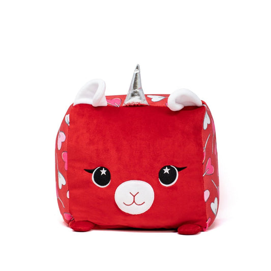 Meet Amora the Llamacorn Plushie, a cube-shaped red unicorn featuring a silver horn, round black eyes, and a white snout. It’s adorned with pink and white heart patterns on its sides, making it ideal for Valentine's Day gifting.