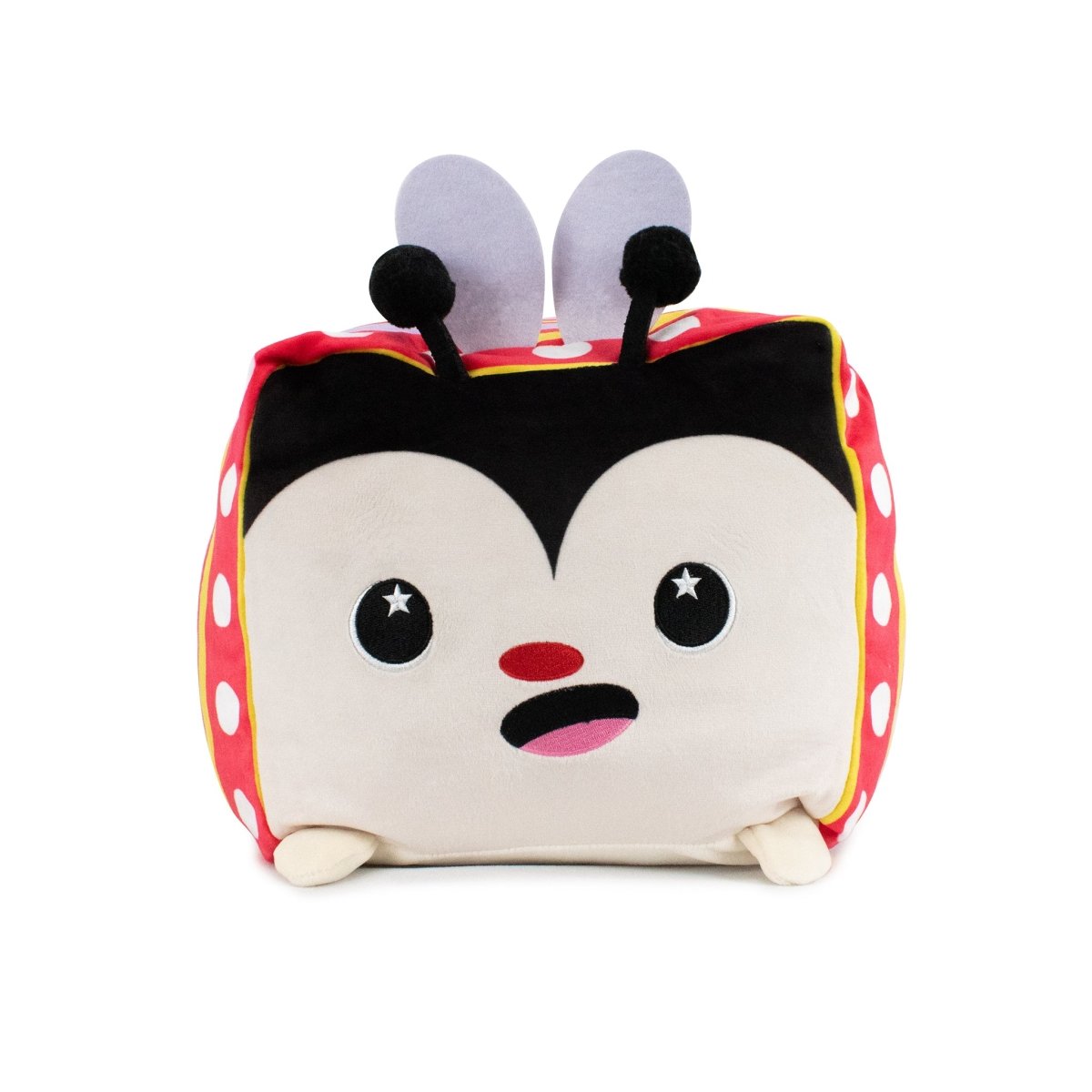 Avril the Ladybug Plushie features a square body with a red polka-dotted design, black pom-pom antennae, and an adorable face with starry eyes and an open mouth. Its floppy white wings enhance its sensory softness, making it perfect for Easter.