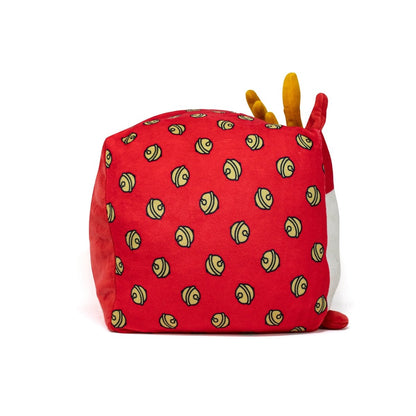 A red, cube-shaped Belle Plushie reindeer with yellow spiral patterns, two yellow antler-like protrusions, and a small red tail is shown against a white background.