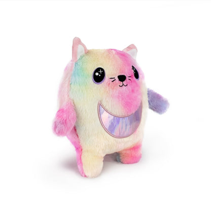 Cat Bestie Monstah is a pastel rainbow plush cat with sensory-soft fur, shiny silver crescent belly, big eyes, pink ears, and a friendly smile—perfect for cuddly toy fans. Stands upright on a white background.