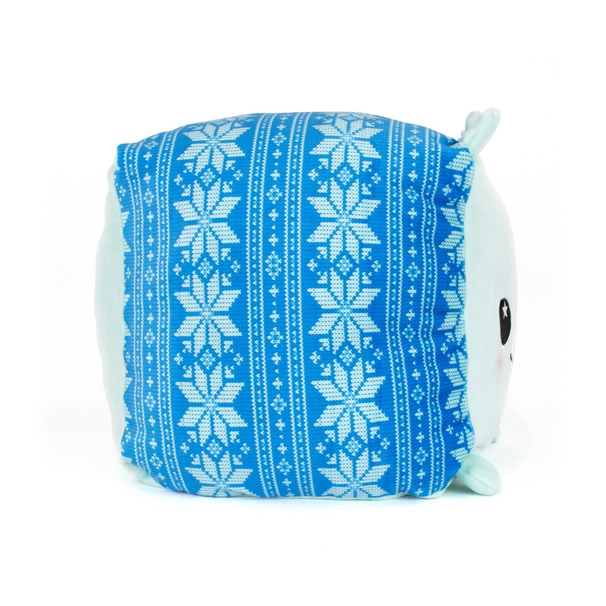 Blitz the Polar Bear is a cuddly plush toy with a blue side panel featuring a white snowflake and geometric knit-like pattern. Made from ultra-soft materials, Blitz’s face and light blue ears are partly visible on the right side.