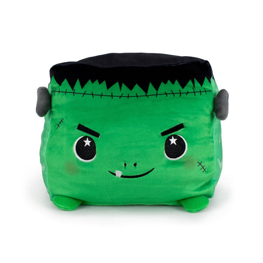 Boris the Monster is a green ultra-soft plush cube with a smiling Frankenstein face, black stitched hair, gray bolts on the sides, and small feet—perfect for cozy cuddles.